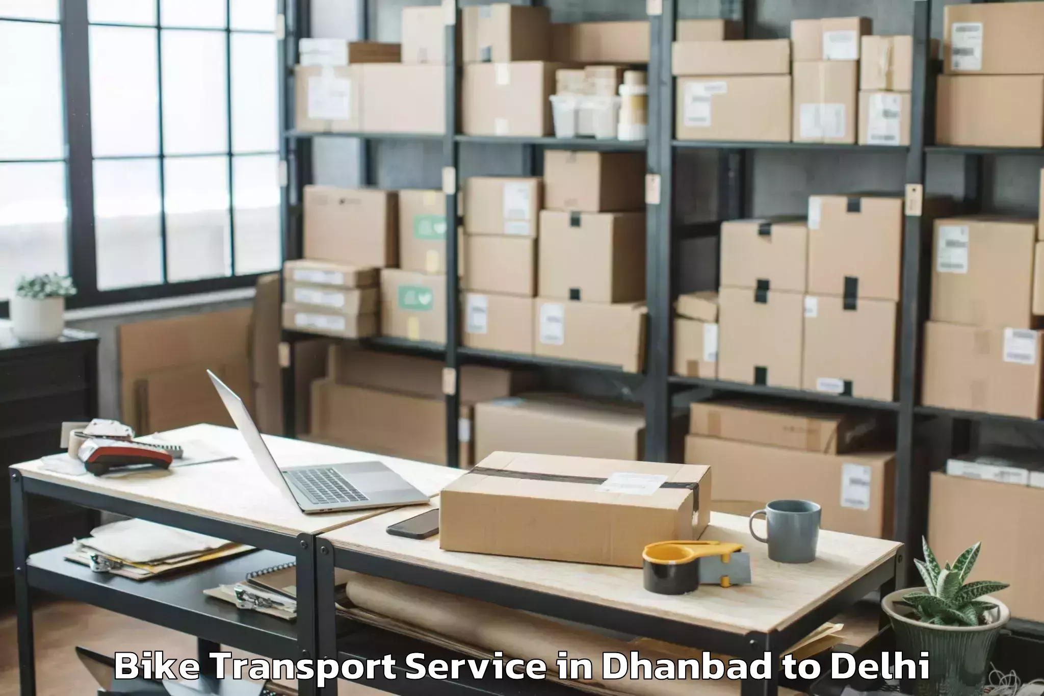 Book Your Dhanbad to South Asian University New Del Bike Transport Today